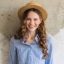 https___elements.envato.com_young-attractive-stylish-woman-sitting-at-wall-bac-T34CKY3-1.jpg